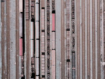 Aerial view from flying drone of trains on the railway station