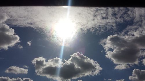 Sun shining through clouds