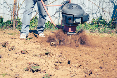 Low section of man working at construction site