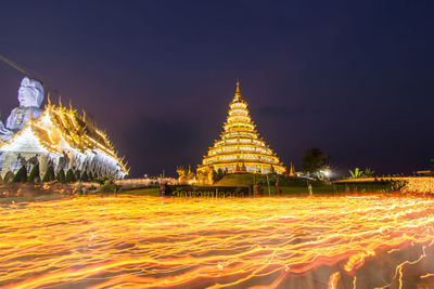 Illuminated temple at night