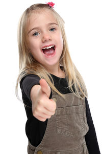 Portrait of cute girl against white background