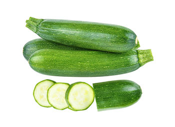 Close-up of green pepper against white background