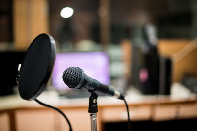 Close-up of microphone in sound recording studio