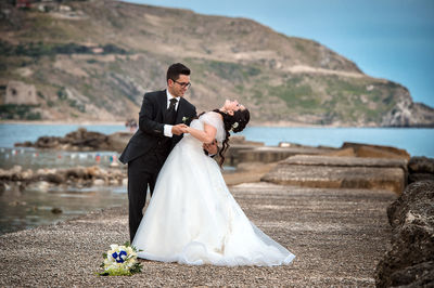 Young couple kissing on beach