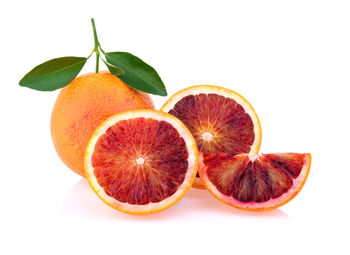 Close-up of orange against white background