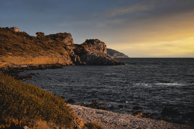 Scenic view of sea against sky during sunset