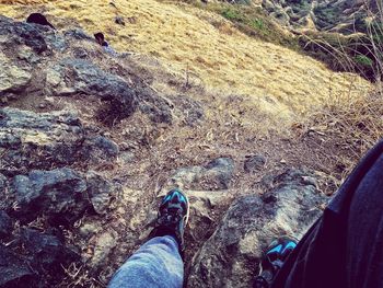 Low section of man standing on floor
