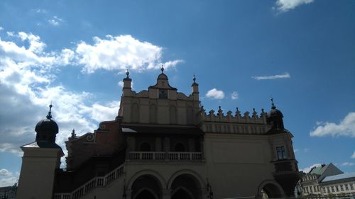 Low angle view of church against blue sky