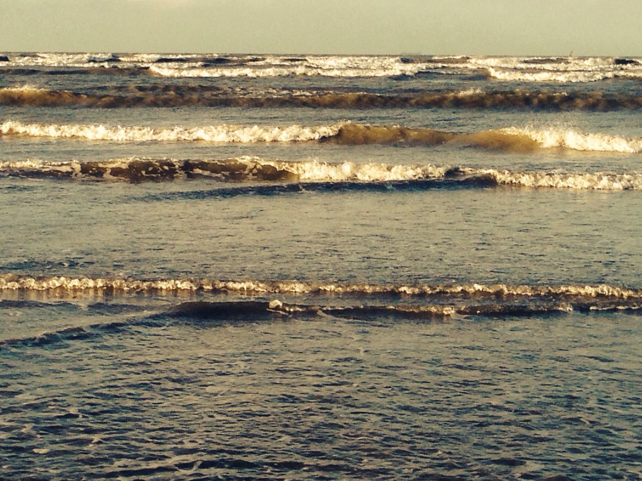 sea, water, horizon over water, tranquil scene, scenics, waterfront, tranquility, beauty in nature, wave, nature, rippled, beach, seascape, idyllic, shore, sky, outdoors, remote, no people, calm