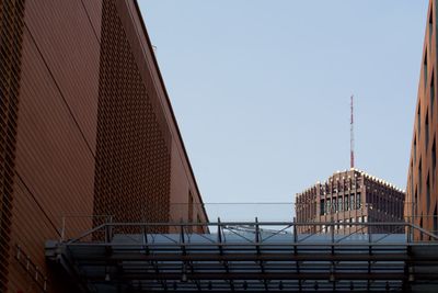 Low angle view of modern building against clear sky