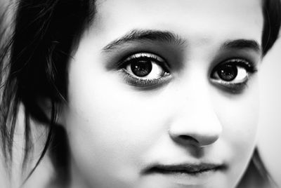 Close-up portrait of smiling teenage girl