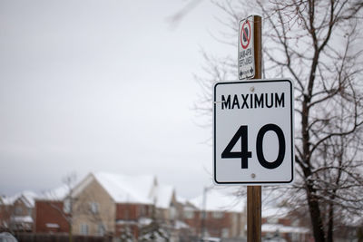 Close-up of road sign on snow