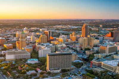 High angle view of cityscape against sky during sunset