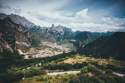 Landscape with mountain range in the background