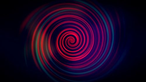 Close-up of light bulb over black background