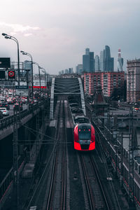 High angle view of train on railroad tracks in city