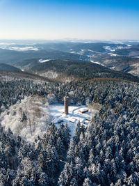 Aerial view of landscape against sky during winter