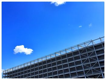 Low angle view of built structure against blue sky