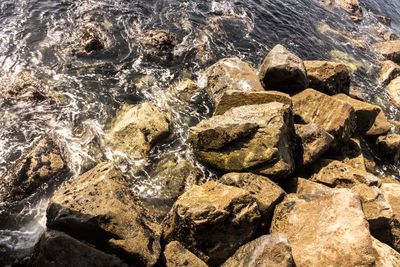 Full frame shot of rocks in water