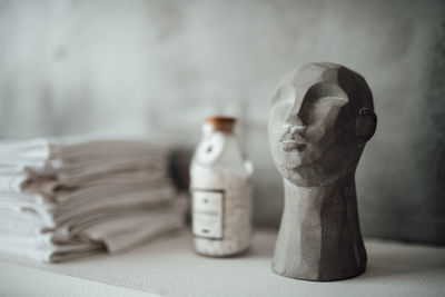 Close-up of statue on table