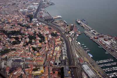 High angle view of crowd on road by buildings