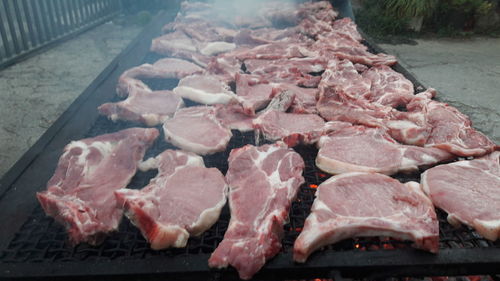 Close-up of meat on barbecue grill