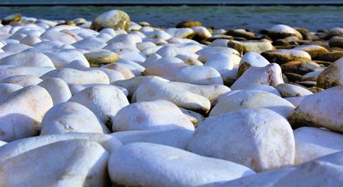 Close-up of pebbles on beach