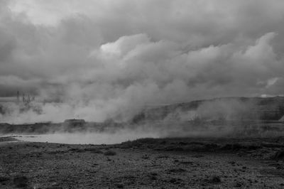 Scenic view of sea against cloudy sky
