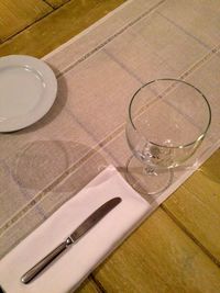 High angle view of wine glasses on table