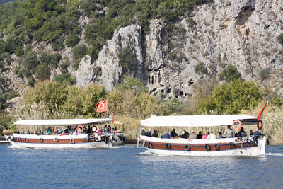 People on boat in sea