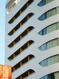 Low angle view of modern building against clear sky