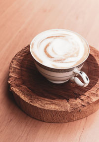 Close-up of cappuccino on table