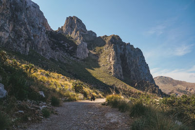 Panoramic view of rocky mountains against sky