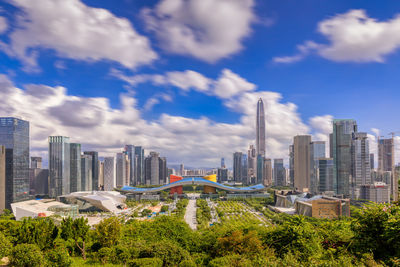 Modern buildings in city against sky