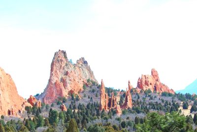 Panoramic view of rock formations against sky