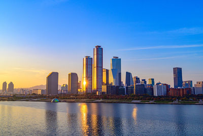 View of city buildings against sky