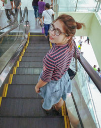 High angle view of women on escalator