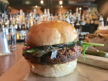Close-up of burger on table in restaurant