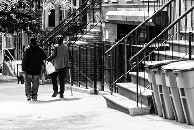 Men walking in city