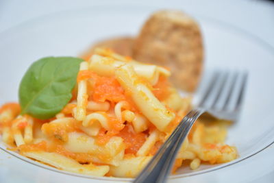 Close-up of pasta in plate on table