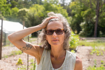 Portrait of young woman wearing sunglasses