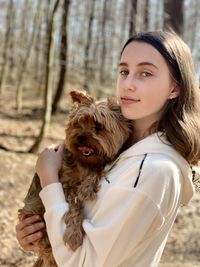 Portrait of woman with dog