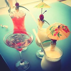 Close-up of beer in glass vase on table