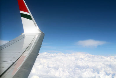 Low angle view of airplane flying in sky