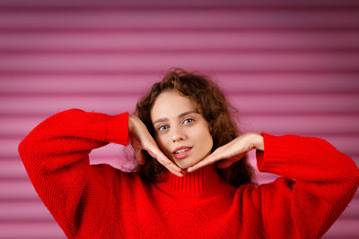 Portrait of young woman looking away