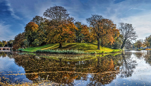 Scenic view of lake against sky during autumn