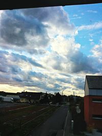 Road against cloudy sky