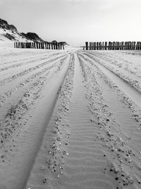 Surface level of tire tracks on beach