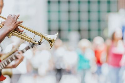 Close-up of hand playing trumpet