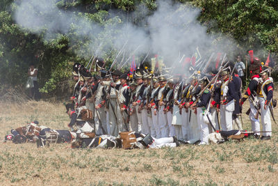 Panoramic shot of crowd in traditional clothing